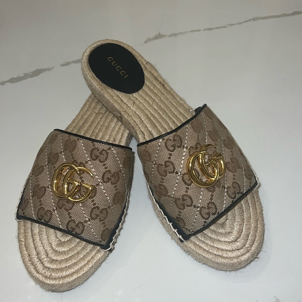 Gucci espadrilles canvas sandal with gold hardware. Used a few times.